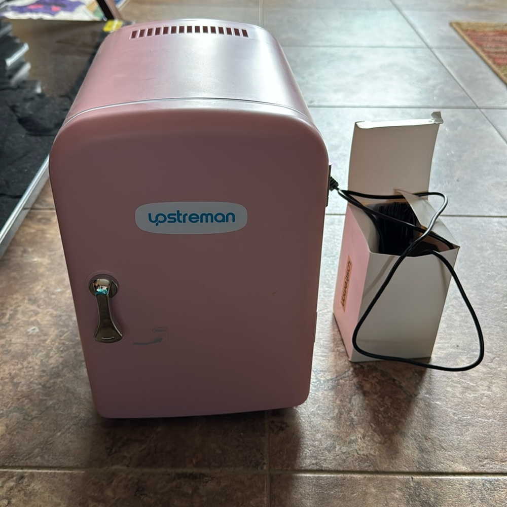 UPSTREMAN pink micro fridge. Comes with all plus.